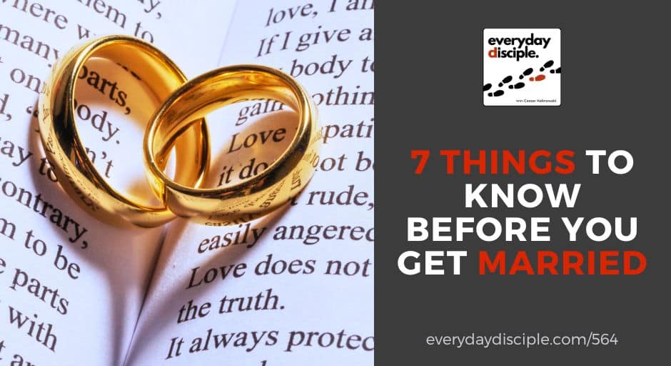 Two gold wedding rings rest on the open pages of a Bible highlighting verses about love.