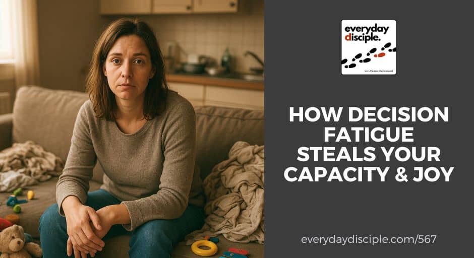 A weary mom sits surrounded by toys and laundry, symbolizing mental exhaustion from too many daily decisions.