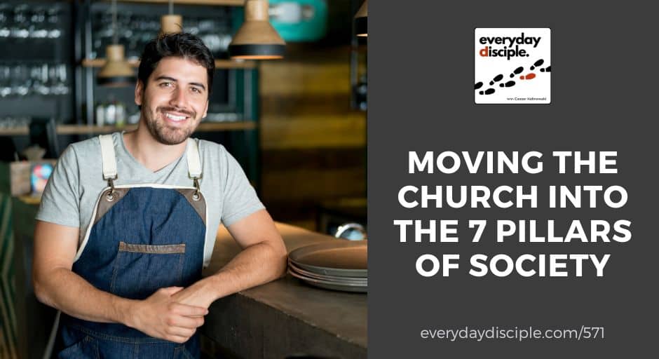 A cheerful restaurant worker stands at the bar of a well-lit café, welcoming his customers as he would his gospel community