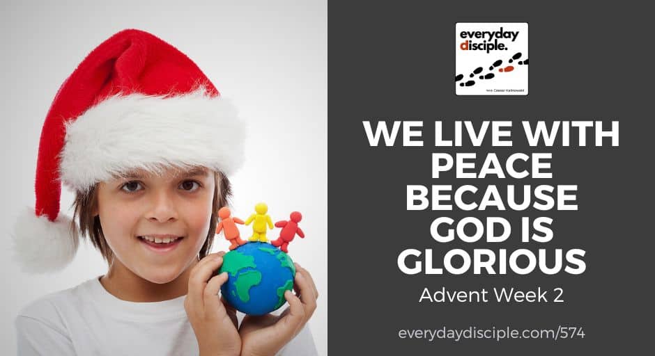 A happy child with a fluffy Santa hat holds a model Earth and figurines symbolizing unity.