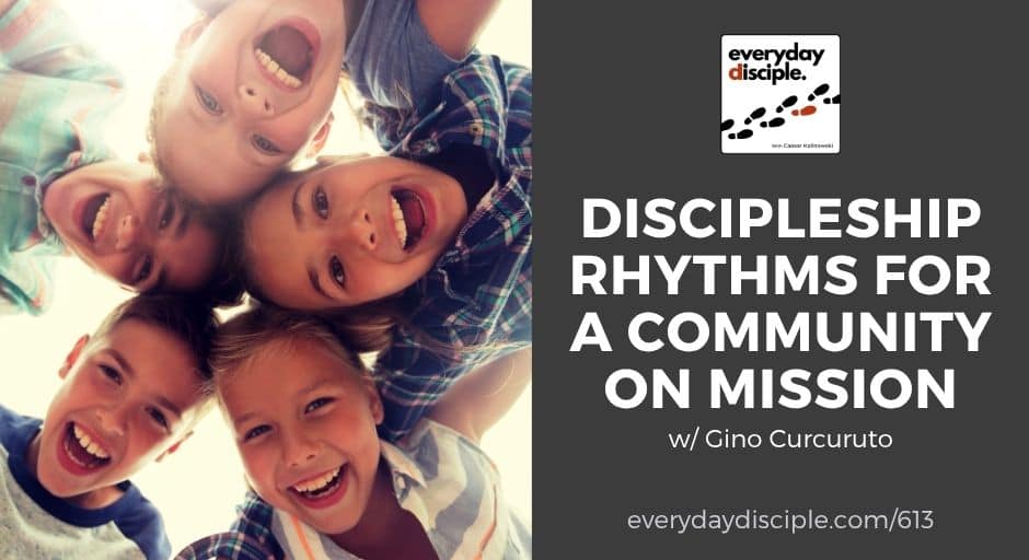 Kids from a missional community in a circle looking down at the camera and laughing